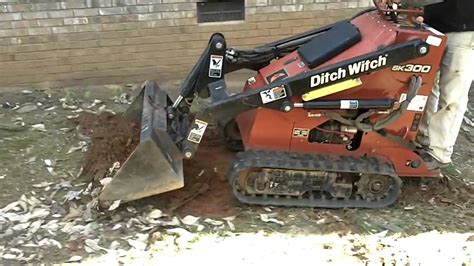 moving 10 cubic yards of dirt with a skid steer|how to use a skid steer.